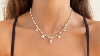 Sea shell, sand dollar, starfish charm beaded necklace with sandy and white shades