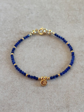 gold personalised engraved bracelet with lapis lazuli gemstone beads and custom initial